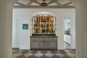 Arched bar with wine room behind